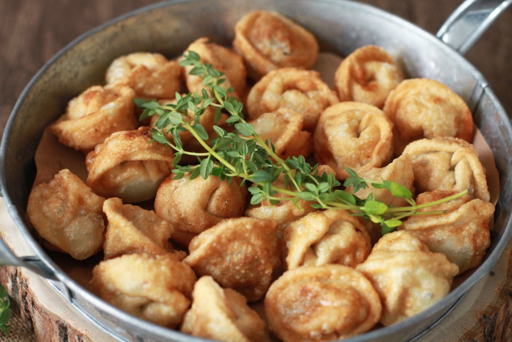 Pan-fried pelmeni with herbs